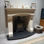 Multi fuel stove in slate inset with marble surround